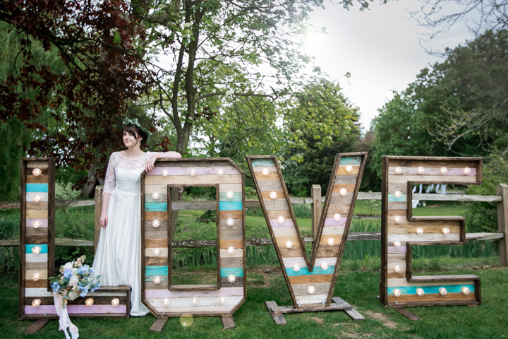Consider having a large marquee sign like this one - it's a hot trend in wedding decor now