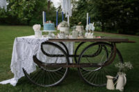 07 The wedding dessert table was a vintage trolley, and it was decorated with a lace tablecloth and candles