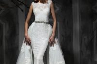 07 a sheath lace wedding dress with cap sleeves and a lace overskirt, an embellished belt