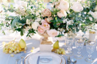 08 The wedding tablescape was done in pastels with sunny yellow touches and gold-rimmed items