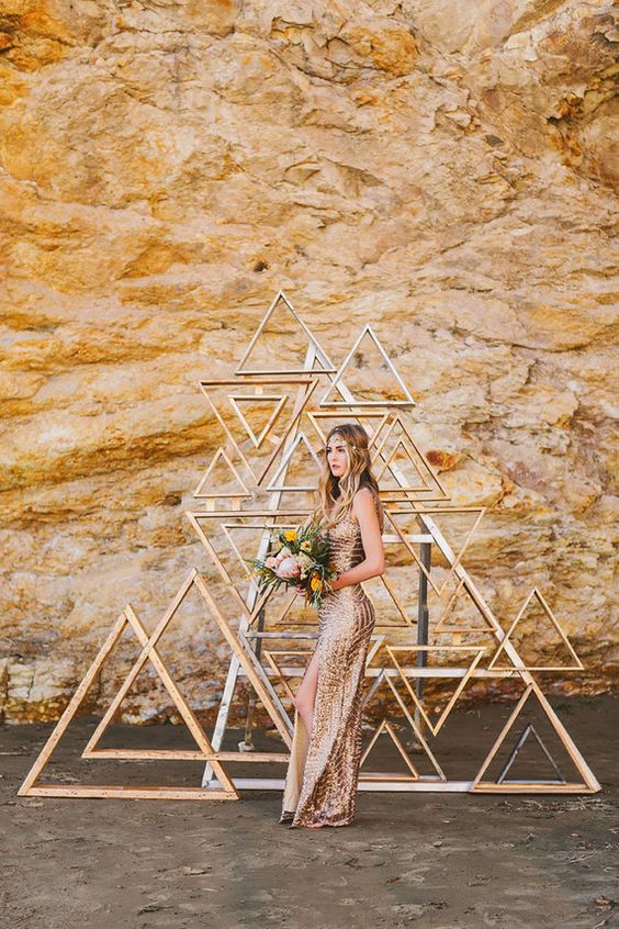 a copper sequin wedding dress with a side slit and wide straps for a boho bride