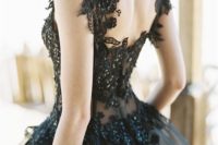 08 a refined wedding dress with a black lace bodice with rhinestones and a tulle skirt