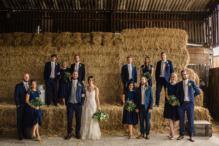 The bridesmaids and groomsmen in navy