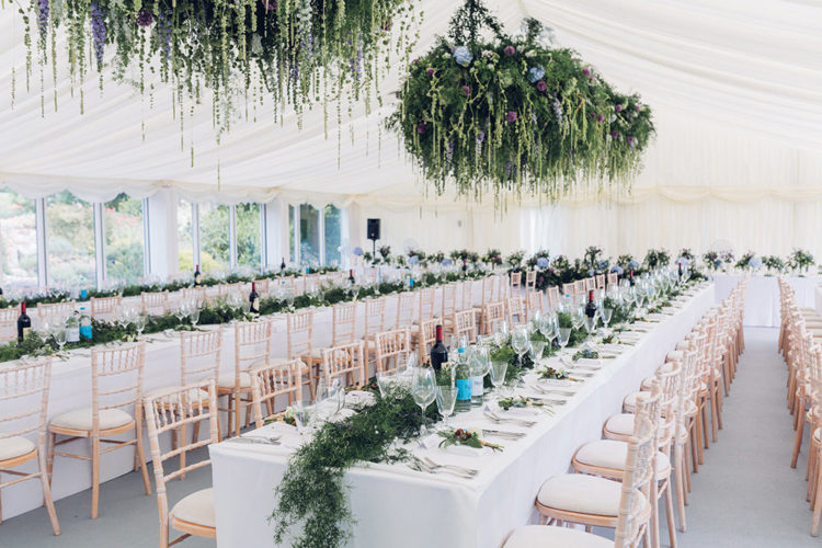 The reception was decorated in woodland style, with lush greenery and flowers, and the table runners were also of greenery