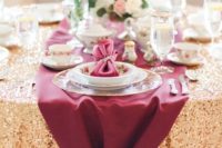 09 a gold sequin tablecloth and a plum fabric table runner over it