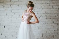 09 a sleeveless wedding dress with a copper sequin bodice on wide straps and with a layered tulle skirt looks very girlish