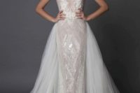 09 a spakling sleeveless sheath wedding dress with lace appliques and an additional tulle overskirt