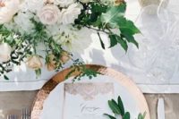 10 a copper charger, whites and some touches of emerald greenery for an elegant tablescape