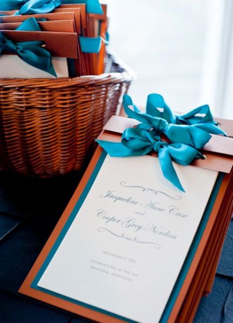 teal and copper ceremony programs with bows