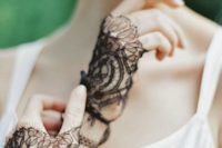 12 black lace gloves for a Gothic bride