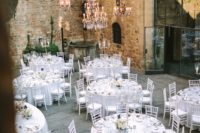13 refined all-white wedding reception in a castle inner courtyard looks romantic and glam