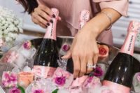 13 serve pink champagne with fresh rose ice cubes and real blooms for a glam feel