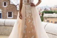 15 off the shoulder lace wedding dress with a matching overskirt