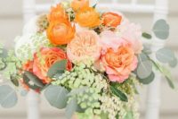 15 soft peachy wedding bouquet with orange ranunculus for a late summer wedding