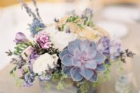 16 a wooden box with wildflowers and a pale succulent will be a great fit for a pastel wedding with a rustic feel