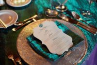 18 copper flatware and chargers, shiny teal npakins and a tablecloth for an exquisite look