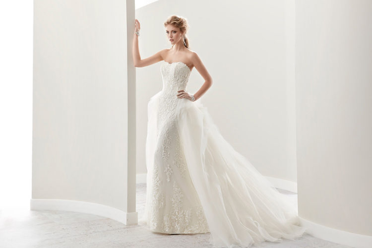strapless lace sheath wedding dress with a lace overskirt that turns it into a beautiful ballgown