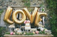 22 giant LOVE letter balloons for a dessert table backdrop