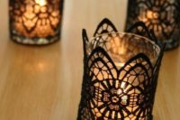 22 glass candle holders covered with black lace will make your table setting more refined and chic