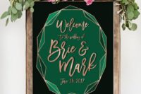 23 a framed wedding sign with a geometric emerald detail and copper calligraphy