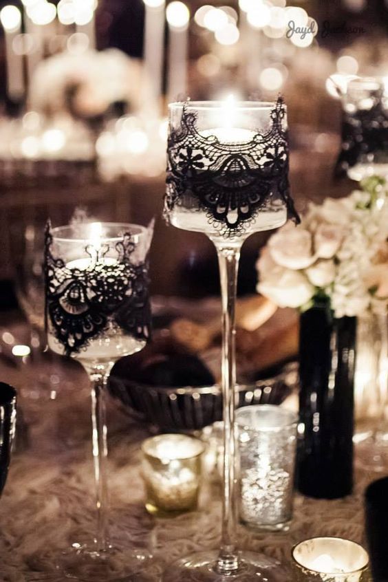 glass candle holders with black lace wrapping for an elegant look