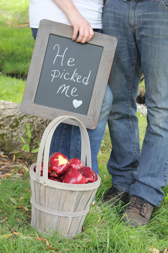 apples are truly fall-like, and you can incorporate them into your engagement shoot