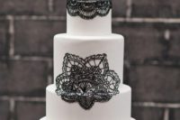 25 a chic white and black lace wedding cake will be a great fit any modern wedding