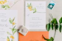 25 wedding stationary with an orange envelope and kumquat prints