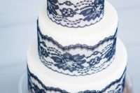 26 a white and black lace wedding cake is a chic and elegant idea