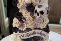 26 bloom and sugar skull wedding cake for a Halloween wedding