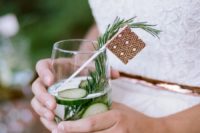 27 cucumber and herb signature wedding cocktail with a copper stirrer