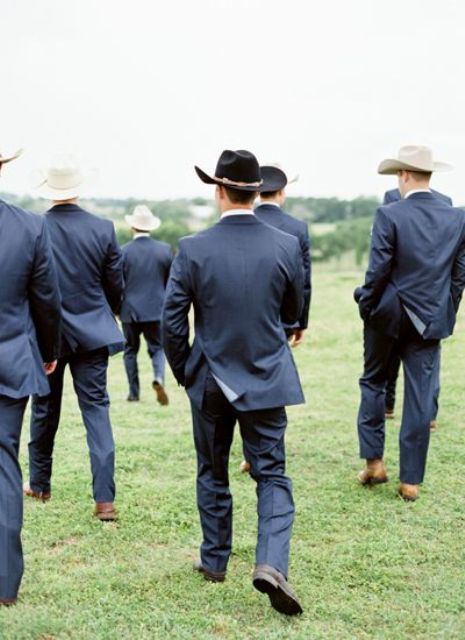 wear cowboy hats to embrace the wedding venue