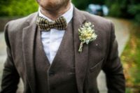 30 a three piece brown tweed suit with a plaid bow tie