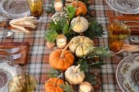 31 oak leaves, nuts, pumpkins and candles for a table runner