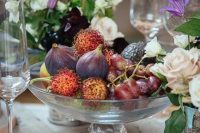 a lovely glass bowl with fresh fruit is a great edible wedding centerpiece for a fall wedding