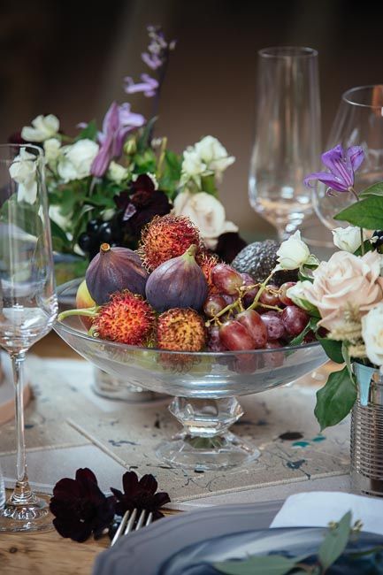 a lovely glass bowl with fresh fruit is a great edible wedding centerpiece for a fall wedding