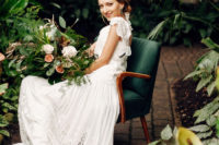 02 The bride was wearing a vintage-inspired lace dress with an open back, emerald shoes, earrings and a lace headband