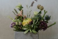 02 a concrete box with greenery and blooms for a modern wedding centerpiece