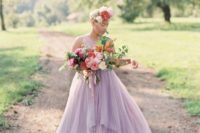 02 a lavender wedding dress without sleeves and with a layered skirt