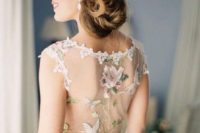 02 a unique wedding dress with an illusion back decorated with butterfly, bird and floral appliques by Claire Pettibone