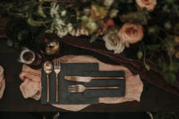 04 You can see granite plates, rose gold cutlery and a plum-colored velvet table runner