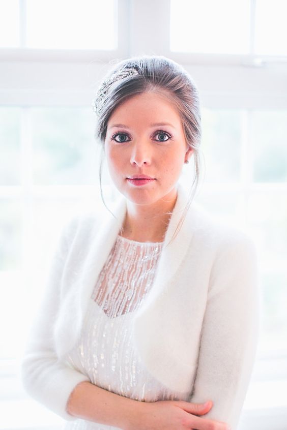 cropped white angora cardigan with cropped sleeves for a snowy wedding