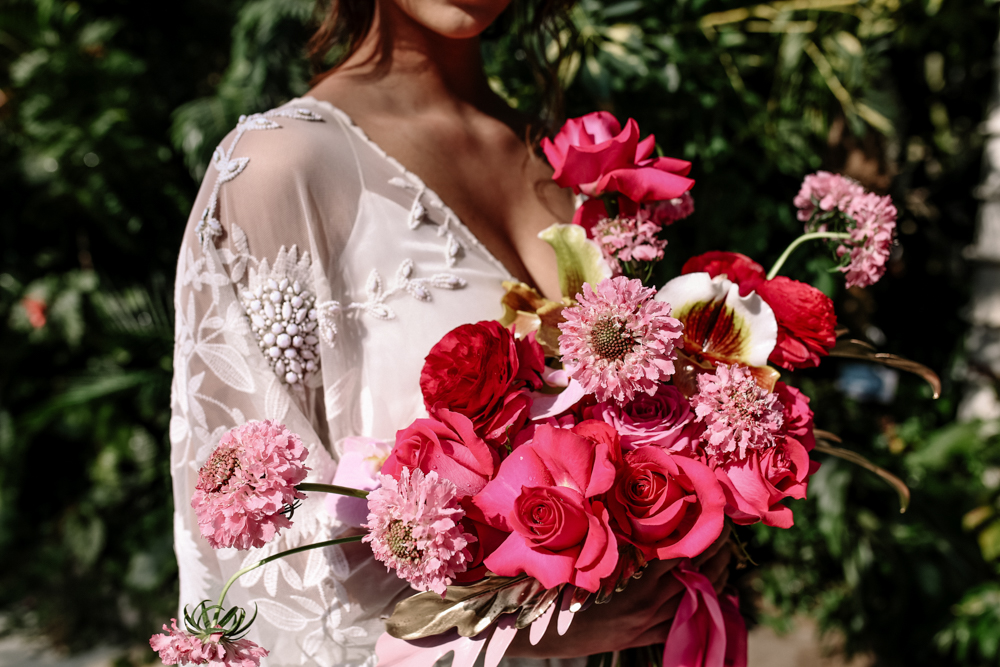 Her bouquet was pink and fuchsia for a gorgeous look