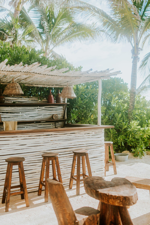 The beach bar was a part of the wedding, just look at those rustic stools