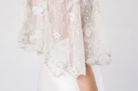 05 embellished lace applique capelet for a sleek modern wedding dress