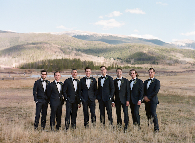 The groom and groomsmen were rocking classic black tuxedos