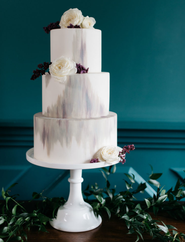 The second wedding cake was a marbleized one with dark and white blooms