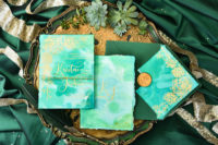 09 The wedding stationery was done in emerald watercolor and with gold calligraphy