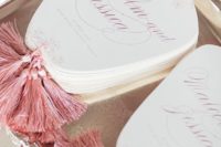 luxury fan shaped wedding programs with pink tassels look cute and interesting