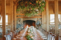 10 The wedding reception was rustic – greenery, blush and peachy blooms, rose sequin tablecloths and a fireplace for coziness